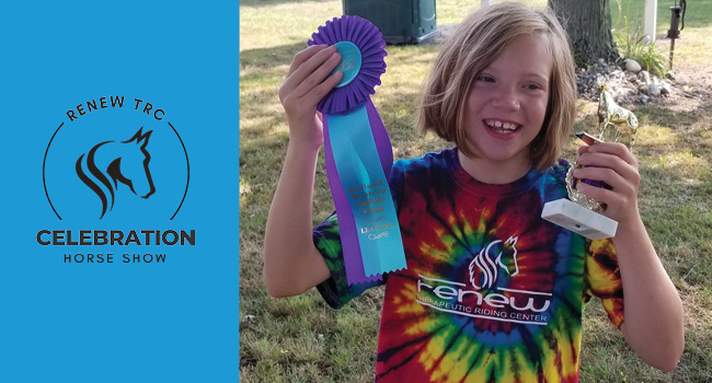 Student posing with horse show ribbon and trophy.